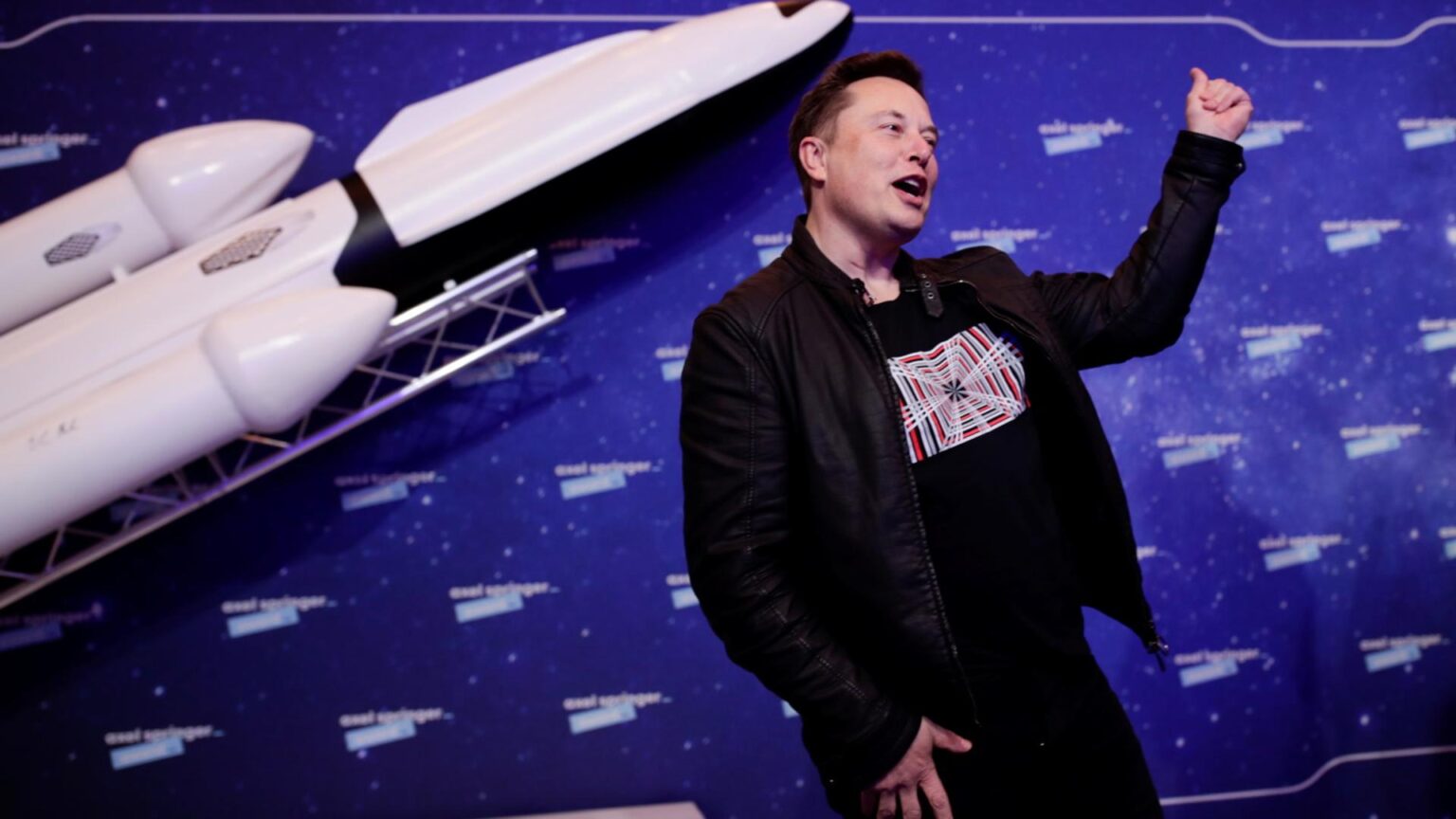 Logotipo da SpaceX com fundo de estrelas